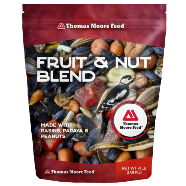 Thomas Moore Feed Fruit & Nut Blend 4 lb bird seed pouch with raisins, papaya, peanuts, and woodpecker on red packaging