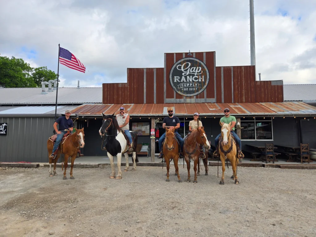 Gap Ranch Supply And Mercantile, LLC building with people on horses in the front of it